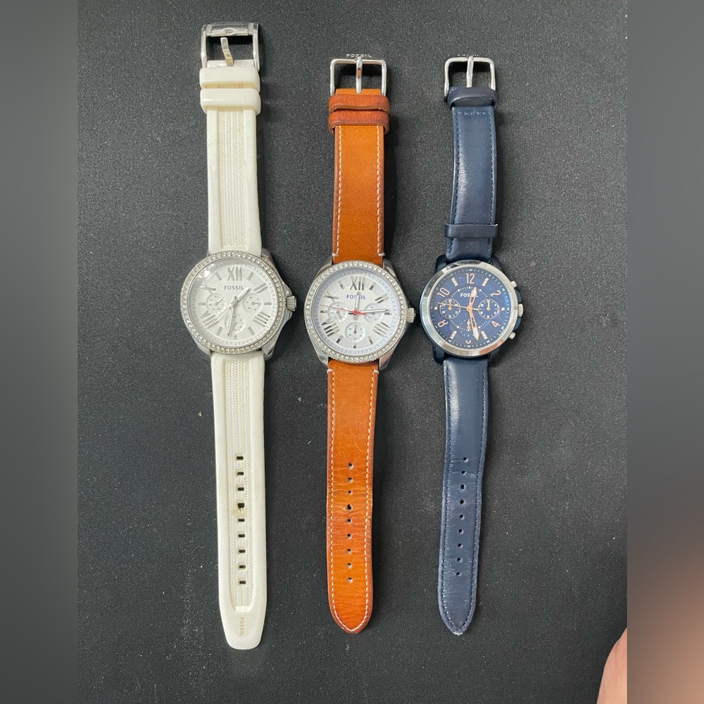 3 Fossil women’s watches, needs batteries. Good condition. 2 with leather bands.